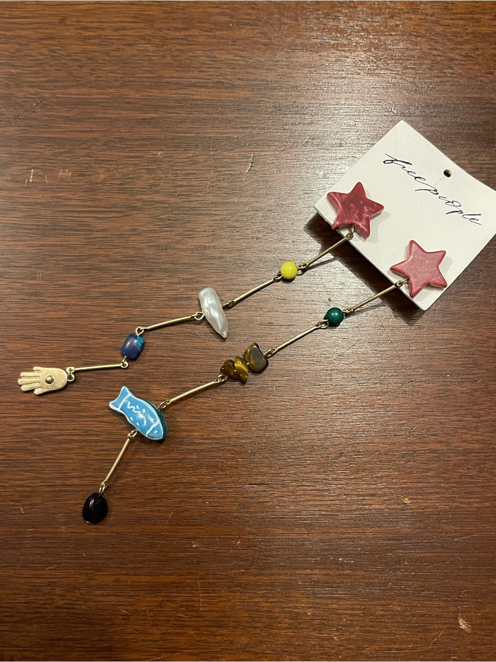 Free people star dangle earring. NWT